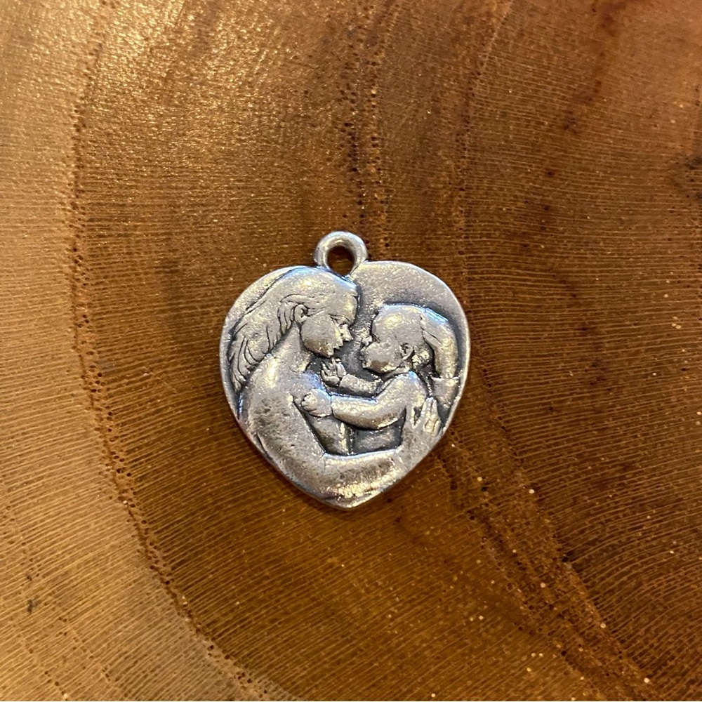James Avery “Tender Care” charm, sterling silver